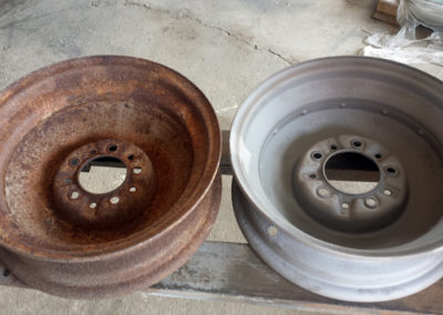 Before and after shot of 1932 car rims, sandblasted by XTREME Fabrication of Maryland.