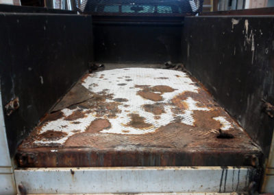 BEFORE: Customer's truck bed floor rusted out...
