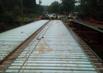 XTREME Fabrication finished laying the deck in the rain to keep customer from falling behind on project deadlines.